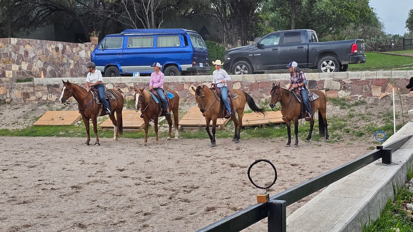 Friends riding the obstacle course during the arena play day