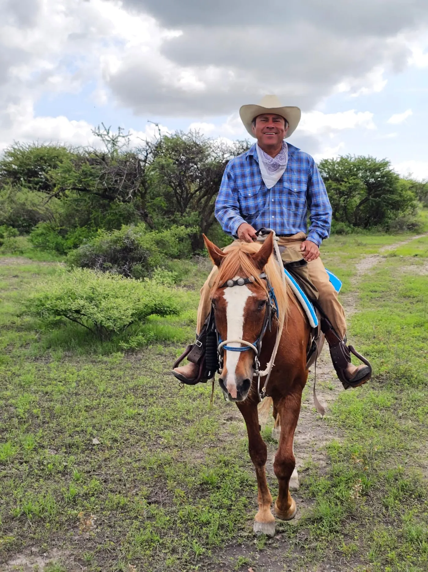 Roberto riding the trails near the ranch